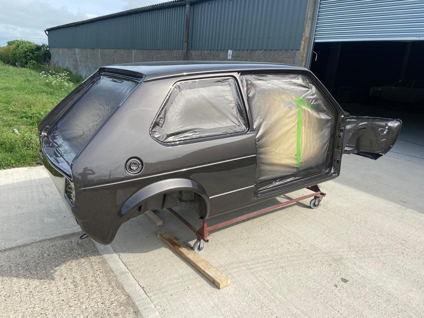 Mk1 shell painted dark anthracite brown on a dolly