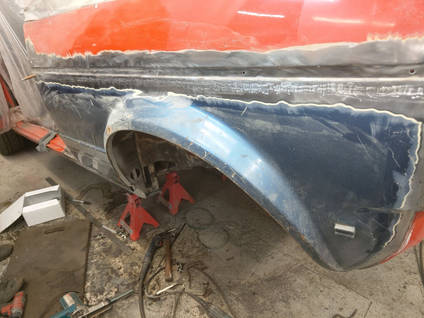 New metal welded into the rear arch of a blue Mk1 GTI