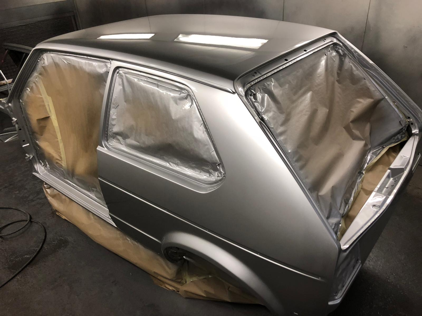 Mk1 shell in fresh silver paint, masked up in the booth